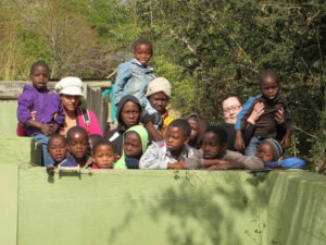 Clare looking after some of the kids in South Africa