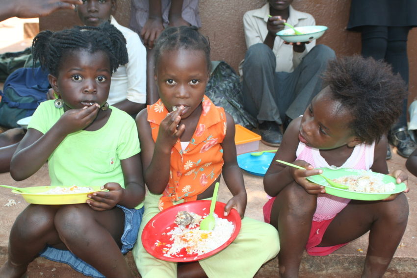 Missionary work abroad, lunchtime at an MSC food station in South Africa. 