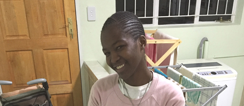 Nthabiseng volunteering at the Holy Family Care Centre, home to many AIDS Orphans