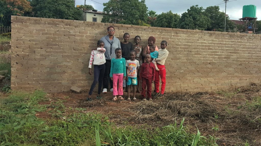 Waterval residents at the site of the new Sacred Heart Church