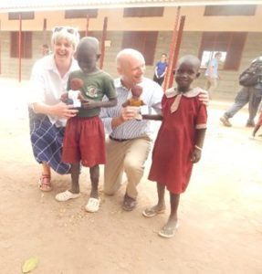 Orla Tracey and the US ambassador with he primary pupils of Loreto Rumbeck