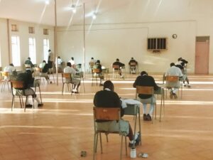 students sitting exams in loreto rumbeck