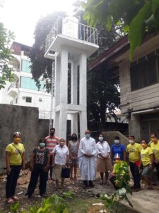 The blessing of the new water system at the OLSH clinic in Marigondon, in the Philippines. (Image via @mscmissionphil on Facebook.)