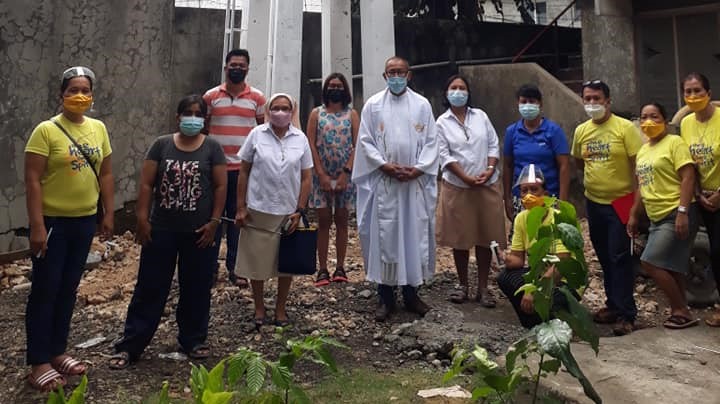 The blessing of the new water system at the OLSH clinic in Marigondon, in the Philippines. (Image via @mscmissionphil on Facebook.)