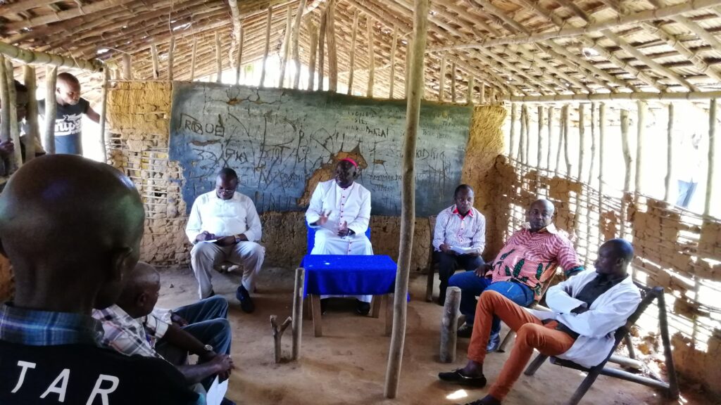 Bishop Toussaint meets with teachers in the continuous work of improving and building upon desperately needed educational facilities in the Yetsi region in the diocese of Bokungu-Ikela in the Democratic Republic of Congo.