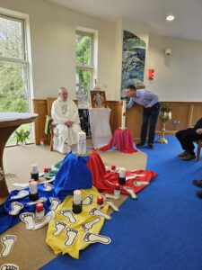 Fr Carl Tranter MSC as president of the Chapter blows out the Chapter Candle to conclude the chapter week